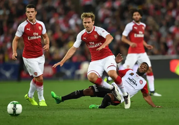 Framed Print : Nacho Monreal vs. Abraham Majok: A Clash of Football Titans (Sydney, Australia 2017)