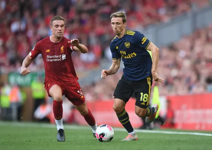 Framed Print : Nacho Monreal vs. Jordan Henderson: Battle at Anfield - Liverpool vs. Arsenal, Premier League 2019-20