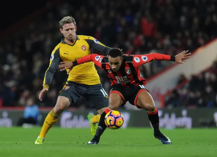 Framed Print : Nacho Monreal vs. Junior Stanislas: Intense Clash Between AFC Bournemouth and Arsenal in the Premier League Framed Print : Nacho Monreal vs. Junior Stanislas: Intense Clash Between AFC Bournemouth and Arsenal in the Premier League