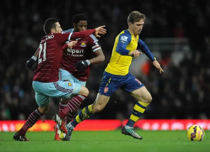 Framed Print : Nacho Monreal vs. Morgan Amalfitano: Intense Battle at the Boleyn Ground (West Ham United vs. Arsenal, Premier League 2014-15) Framed Print : Nacho Monreal vs. Morgan Amalfitano: Intense Battle at the Boleyn Ground (West Ham United vs. Arsenal, Premier League 2014-15)