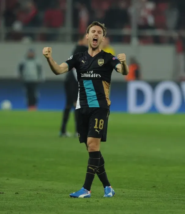 Framed Print : Nacho Monreal's Exuberant Celebration: Arsenal's UEFA Champions League Victory over Olympiacos