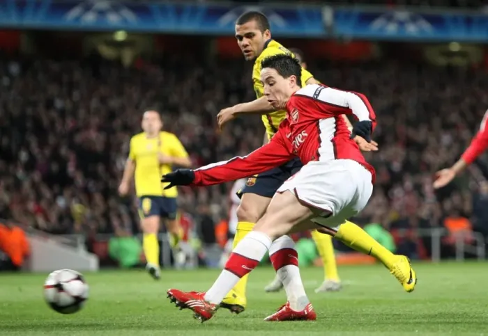 Framed Print : Nasri vs. Alves: Dramatic Draw in Arsenal vs. Barcelona's 2010 UEFA Champions League Quarterfinal