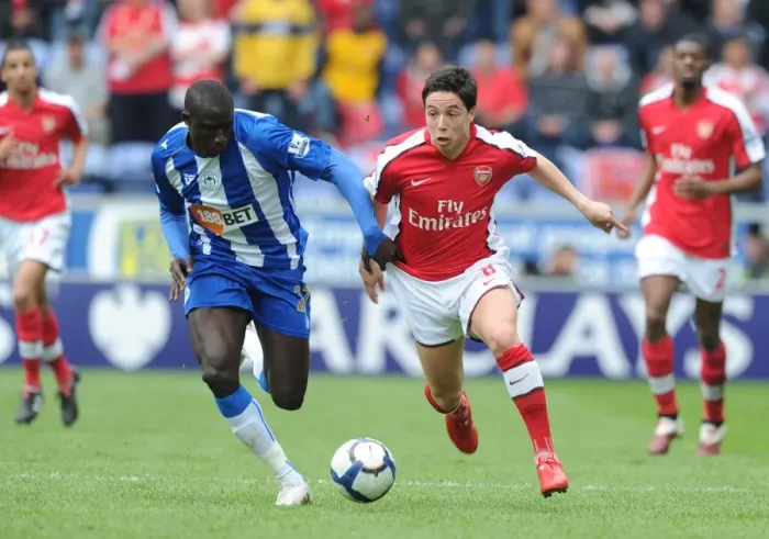 Framed Print : Nasri vs Diame: Wigan Athletic's Upset Over Arsenal in FA Premier League (3-2)