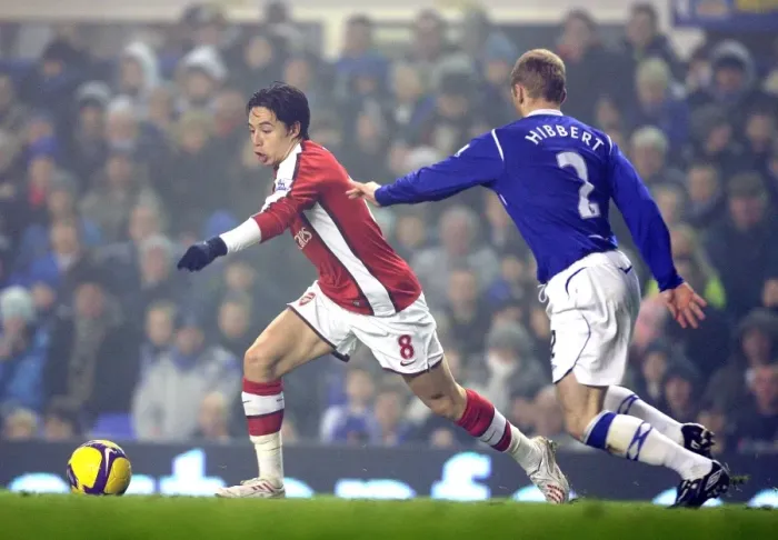 Framed Print : Nasri vs. Hibbert: The Intense Rivalry on the Field - Everton vs. Arsenal, Barclays Premier League, 2009