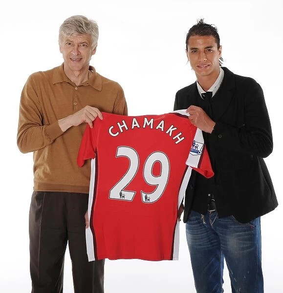 New Arsenal Signing Marouane Chamakh Welcomed by Manager Arsene Wenger at Arsenal Training Ground