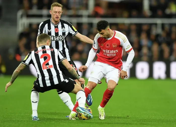 Framed Print : Newcastle United vs. Arsenal FC: A Battle for Possession - Premier League 2023-24