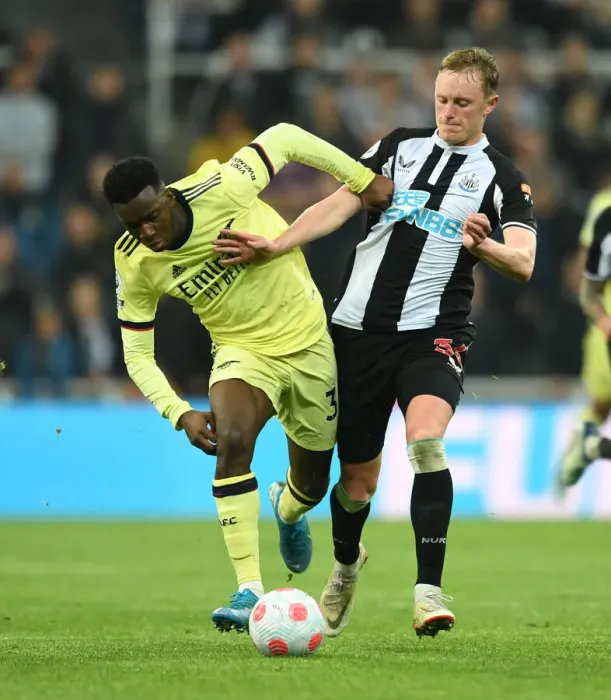Framed Print : Newcastle United vs. Arsenal: Intense Battle Between Eddie Nketiah and Sean Longstaff in Premier League Clash Framed Print : Newcastle United vs. Arsenal: Intense Battle Between Eddie Nketiah and Sean Longstaff in Premier League Clash