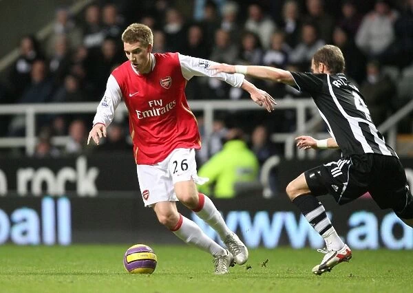 Nicklas Bendtner (Arsenal) David Rozehnal (Newcastle)