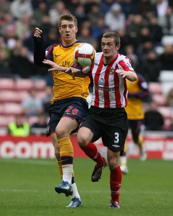 Framed Print : Nicklas Bendtner (Arsenal) George McCartney (Sunderland) Framed Print : Nicklas Bendtner (Arsenal) George McCartney (Sunderland)