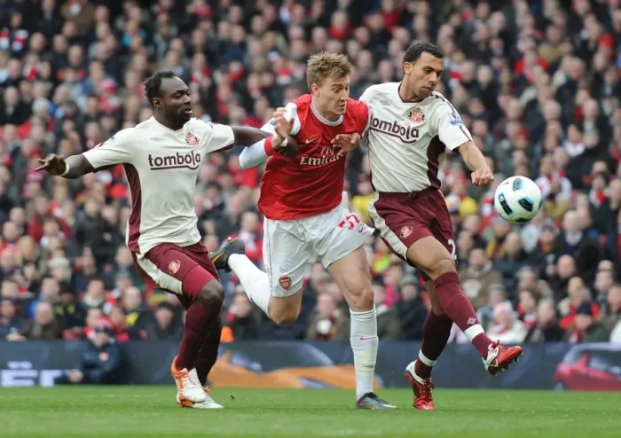 Framed Print : Nicklas Bendtner (Arsenal) John Mensah and Anton Ferdinand (Sunderland) Framed Print : Nicklas Bendtner (Arsenal) John Mensah and Anton Ferdinand (Sunderland)