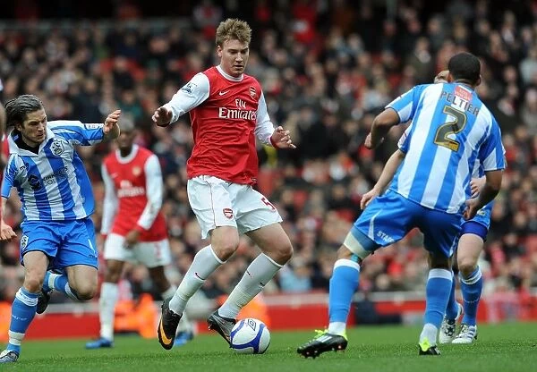 Nicklas Bendtner (Arsenal) Lee Peltier (Huddersfield). Arsenal 2:1 Huddersfield Town