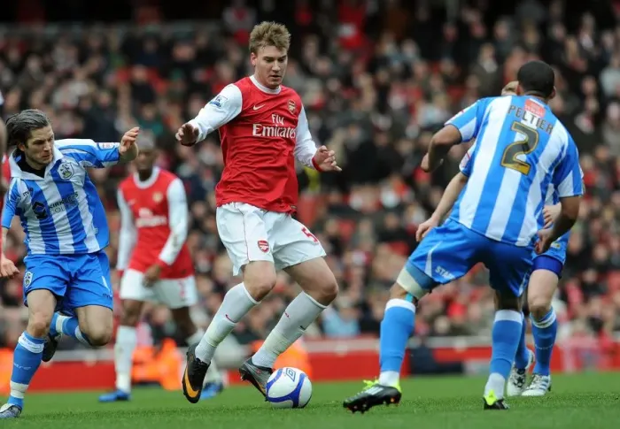 Framed Print : Nicklas Bendtner (Arsenal) Lee Peltier (Huddersfield). Arsenal 2: 1 Huddersfield Town Framed Print : Nicklas Bendtner (Arsenal) Lee Peltier (Huddersfield). Arsenal 2: 1 Huddersfield Town