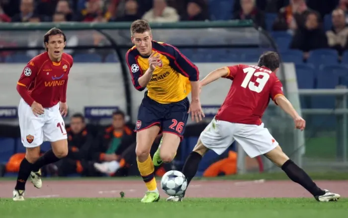 Framed Print : Nicklas Bendtner (Arsenal) Rodrigo Taddei and Marco Motta (Roma)