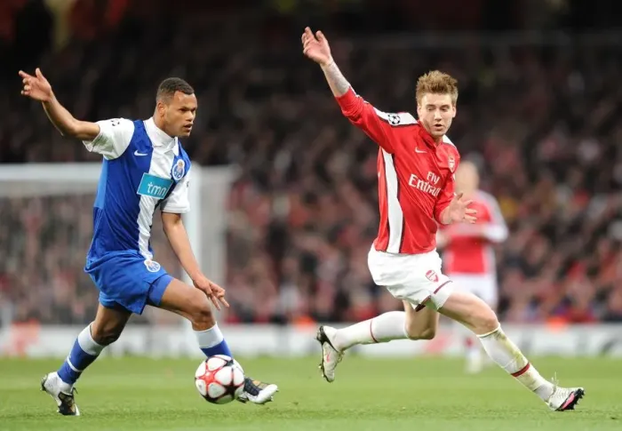 Framed Print : Nicklas Bendtner (Arsenal) Rolando (Porto). Arsenal 5: 0 FC Porto, UEFA Champions League First Knockout Round, Second Leg, Emirates Stadium, Arsenal Football Club, London, 9  /  3  /  2010. Credit : Stuart MacFarlane  / 