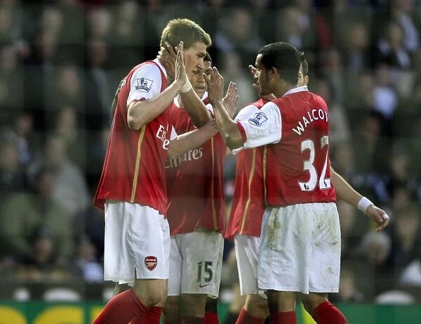 Nicklas Bendtner celebrates scoring the 1st Arsenal goal with Denilson