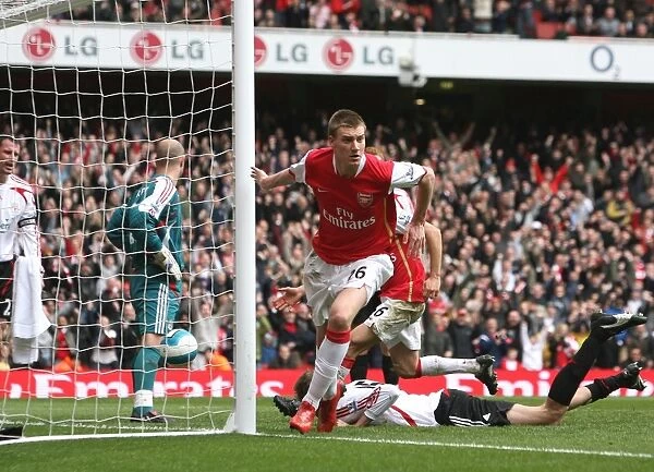 Nicklas Bendtner celebrates scoring the Arsenal goal