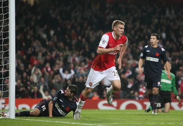 Nicklas Bendtner celebrates scoring Arsenals 7th goal