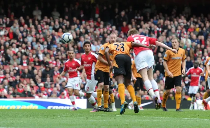 Framed Print : Nicklas Bendtner heads past Ronald Zubar to score the Arsenal goal. Arsenal 1 Framed Print : Nicklas Bendtner heads past Ronald Zubar to score the Arsenal goal. Arsenal 1