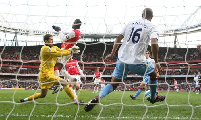Framed Print : Nicklas Bendtner shoots past Aston Villa goalkeeper Scott Carson and defender Zat Knight to score the Arsenal goal. Arsenal 1: 1 Aston Villa, Barclays Premier League, Emirates Stadium, 1  /  3  /  2008. Credit : Stuart MacFarlane  /  Arsenal