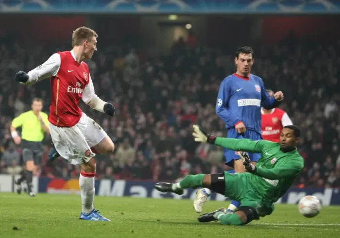 Framed Print : Nicklas Bendtner shoots past Bucuresti keeper Robinson Zapata to score the 2nd Arsenal goal Framed Print : Nicklas Bendtner shoots past Bucuresti keeper Robinson Zapata to score the 2nd Arsenal goal