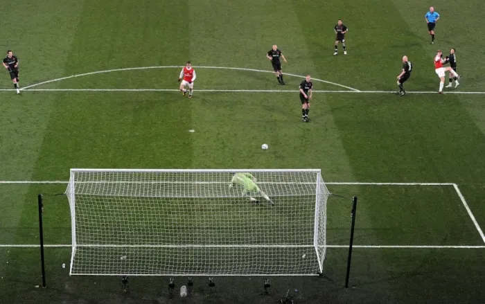 Framed Print : Nicklas Bendtner shoots past Orient goalkeeper Jamie Jones to score the 3rd Arsenal goal Framed Print : Nicklas Bendtner shoots past Orient goalkeeper Jamie Jones to score the 3rd Arsenal goal