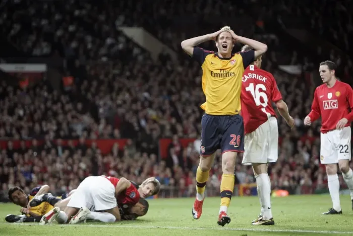 Framed Print : Nicklas Bendtner's Disappointment: Arsenal Trail Manchester United in UEFA Champions League Semi-Final