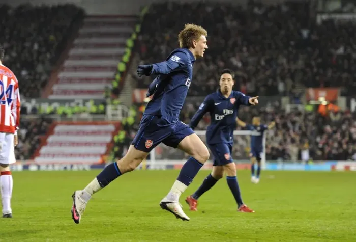 Framed Print : Nicklas Bendtner's Thrilling First Goal: Arsenal Crushes Stoke City 3-1 in the Premier League