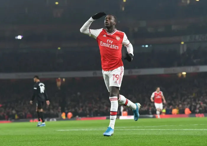 Framed Print : Nicolas Pepe Scores First Arsenal Goal: Arsenal's Triumph Over Manchester United in the 2020 Premier League