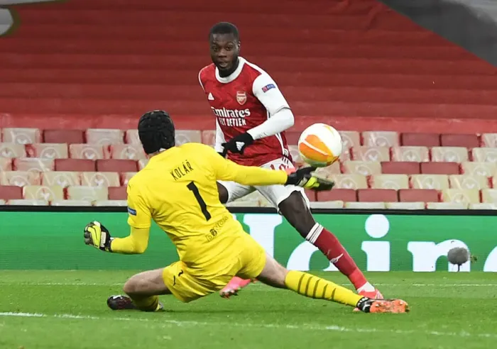Framed Print : Nicolas Pepe's Epic Chip: Arsenal's Europa League Goal in Empty Emirates Stadium (2020-21)