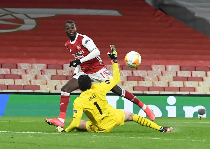 Framed Print : Nicolas Pepe's Spectacular Chip: Arsenal's Winning Goal in Empty Europa League Quarterfinal Against Slavia Praha Framed Print : Nicolas Pepe's Spectacular Chip: Arsenal's Winning Goal in Empty Europa League Quarterfinal Against Slavia Praha