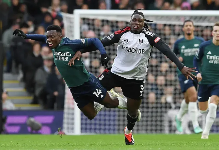 Framed Print : Nketiah vs. Bassey: A Battle at Craven Cottage - Fulham vs. Arsenal in the 2023-24 Premier League Framed Print : Nketiah vs. Bassey: A Battle at Craven Cottage - Fulham vs. Arsenal in the 2023-24 Premier League