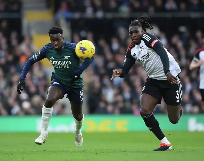 Framed Print : Nketiah vs Bassey: A Premier League Rivalry Unfolds - Fulham vs Arsenal (2023-24)
