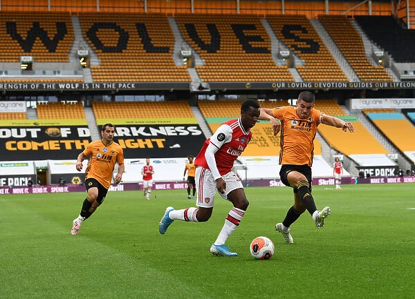 Nketiah vs. Coady: Intense Battle at Molineux - Wolverhampton Wanderers vs. Arsenal FC, Premier League 2019-2020