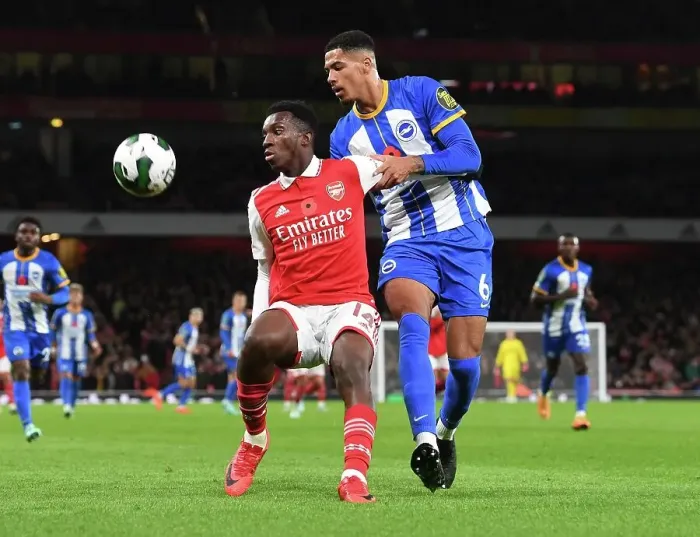 Framed Print : Nketiah vs Colwill: Intense Face-Off in Arsenal's Carabao Cup Battle Against Brighton