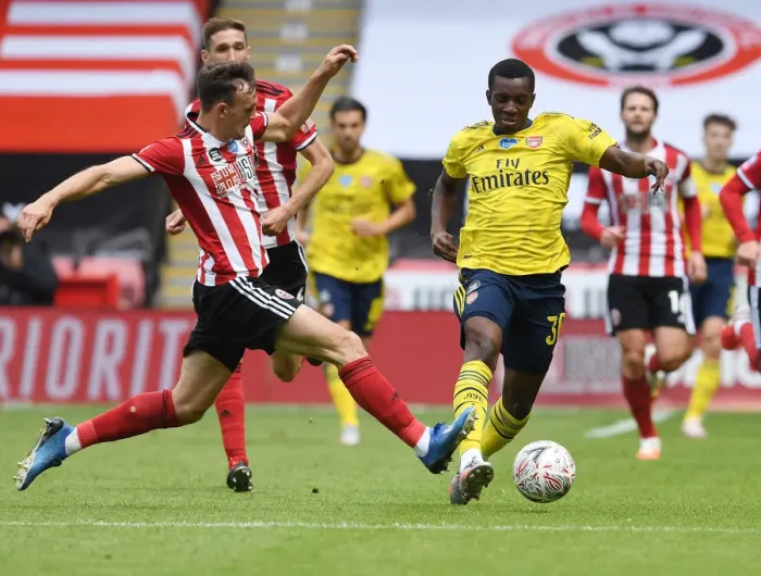 Framed Print : Nketiah vs. Egan: A FA Cup Quarterfinal Battle - Sheffield United vs. Arsenal Framed Print : Nketiah vs. Egan: A FA Cup Quarterfinal Battle - Sheffield United vs. Arsenal