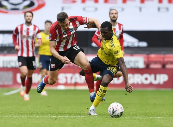 Framed Print : Nketiah vs. Egan: A FA Cup Quarterfinal Showdown - Sheffield United vs. Arsenal