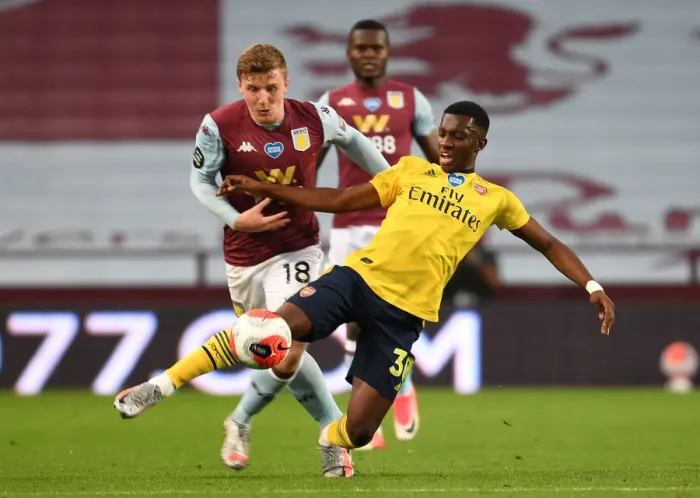 Framed Print : Nketiah vs. Targett: A Premier League Showdown at Villa Park Framed Print : Nketiah vs. Targett: A Premier League Showdown at Villa Park