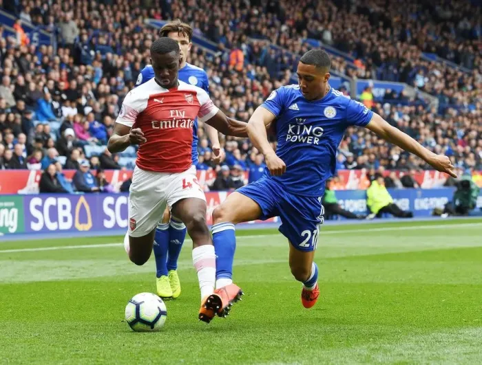 Framed Print : Nketiah vs Tielemans: A Premier League Showdown at The King Power Stadium Framed Print : Nketiah vs Tielemans: A Premier League Showdown at The King Power Stadium