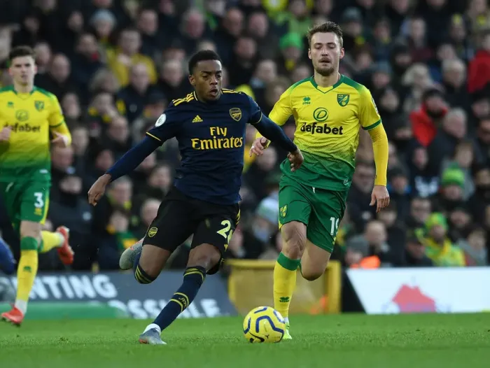 Framed Print : Norwich City vs Arsenal: Joe Willock Clashes with Tom Trybull in Premier League Showdown Framed Print : Norwich City vs Arsenal: Joe Willock Clashes with Tom Trybull in Premier League Showdown