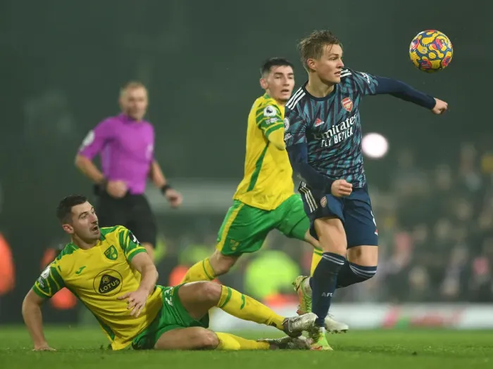 Framed Print : Odegaard Clashes with McLean: Norwich City vs Arsenal, Premier League 2021-22
