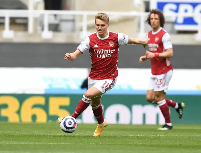 Framed Print : Odegaard Plays Out Empty St. James Park Duel: Arsenal vs. Newcastle (2020-21 Premier League)