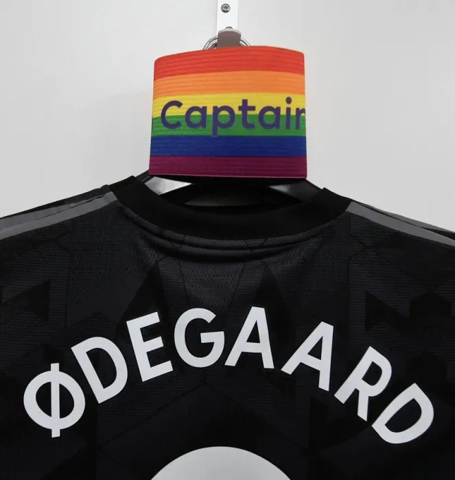Framed Print : Odegaard Prepares for Southampton Clash: Captain's Shirt and Armband in Arsenal Changing Room
