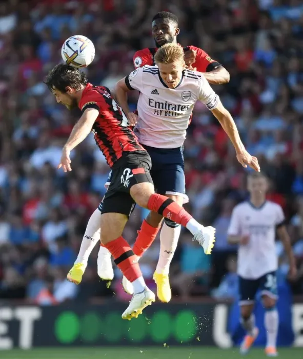 Framed Print : Odegaard Stands Firm: Arsenal's Midfield Battle against Bournemouth's Pearson and Lerma Framed Print : Odegaard Stands Firm: Arsenal's Midfield Battle against Bournemouth's Pearson and Lerma