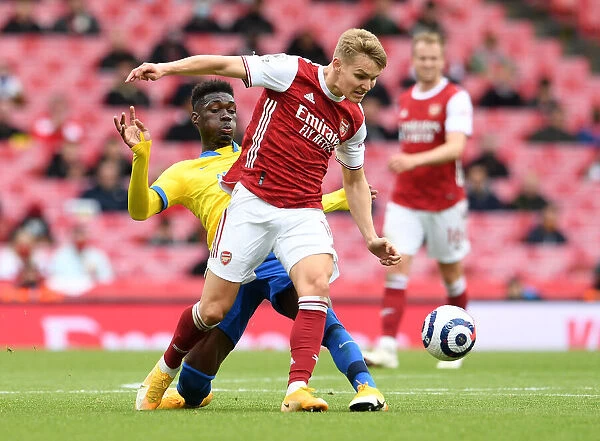 Odegaard vs Bissouma: A Premier League Showdown at Emirates Stadium (2020-21)