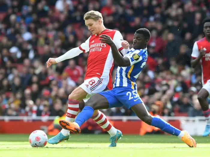 Framed Print : Odegaard vs Caicedo: Intense Rivalry in Arsenal vs Brighton Premier League Clash (April 2022)