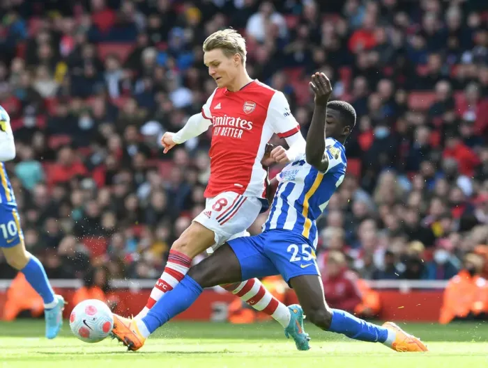 Framed Print : Odegaard vs Caicedo: Intense Rivalry Unfolds - Arsenal vs Brighton Premier League Showdown (2021-22)