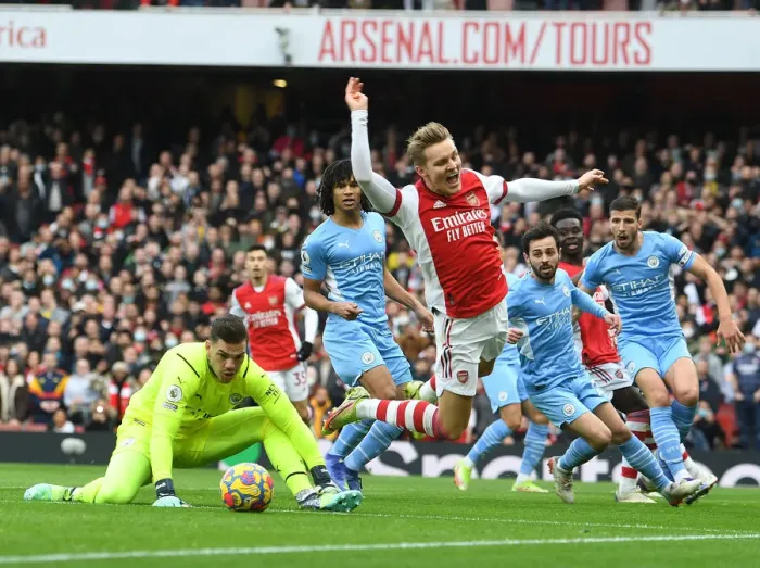 Framed Print : Odegaard vs Ederson: A Clash of Titans at the Emirates - Arsenal vs Manchester City, Premier League 2021-22 Framed Print : Odegaard vs Ederson: A Clash of Titans at the Emirates - Arsenal vs Manchester City, Premier League 2021-22