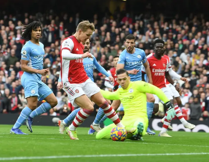 Framed Print : Odegaard vs Ederson: A Premier League Battle at Emirates Stadium - Arsenal vs Manchester City Framed Print : Odegaard vs Ederson: A Premier League Battle at Emirates Stadium - Arsenal vs Manchester City