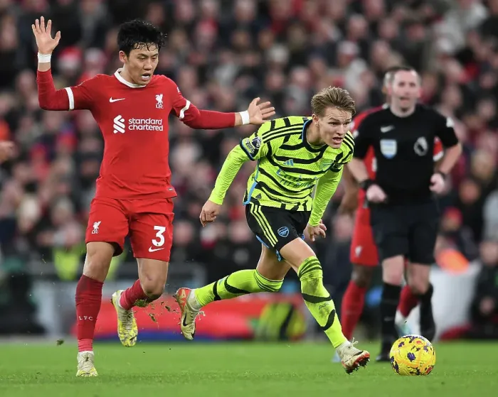 Framed Print : Odegaard vs. Endo: A Premier League Rivalry Erupts at Anfield - Liverpool vs. Arsenal, 2023-24 Framed Print : Odegaard vs. Endo: A Premier League Rivalry Erupts at Anfield - Liverpool vs. Arsenal, 2023-24