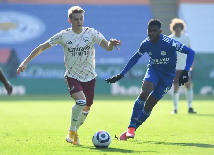 Framed Print : Odegaard vs. Iheanacho: A Premier League Battle at The King Power Stadium Framed Print : Odegaard vs. Iheanacho: A Premier League Battle at The King Power Stadium